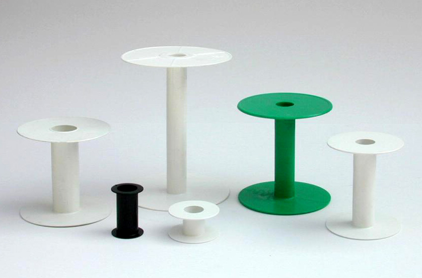 Shock absorbent polystyrene, molded in one piece, suitable for all ribbons that require (zig zag) winding.